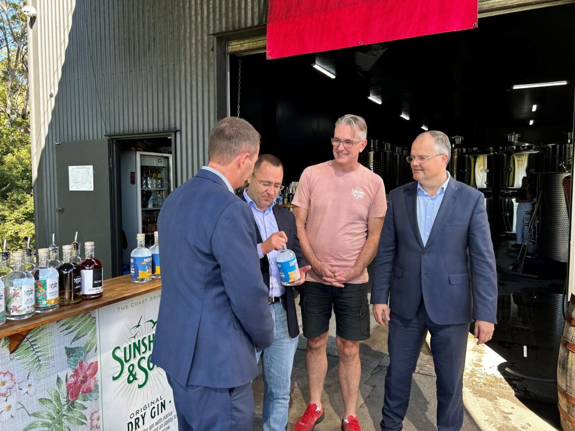 Image showing the Ukranian ambassador holding a bottle of General's Friendship Gin by Sunshine & Sons. He is joined by Matt Hobson, Andrew Wallace and Ted O'Brien.